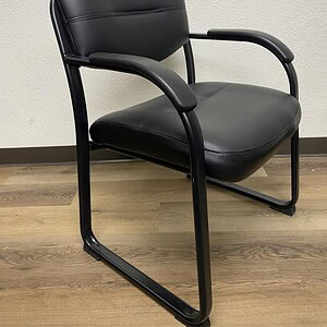 Boss steel black base vinyl seat padded chair for office or waiting areas.