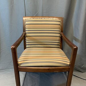 Elegant Bernhardt guest chair with striped upholstery and wooden frame.