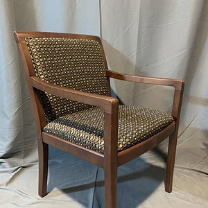 Bernhardt guest chair with wooden frame and patterned upholstery.