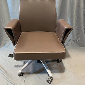 Conference office chair with padded armrests and adjustable height.