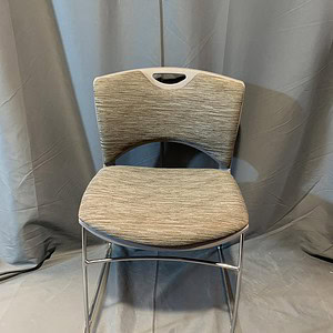 Grey and black fabric stacker chair with metal legs, ideal for office or waiting areas.