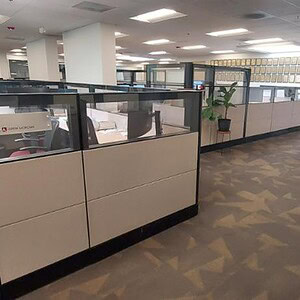 Modern Ethospace dark tone 70/54inT 6x6 bull pen workspace.