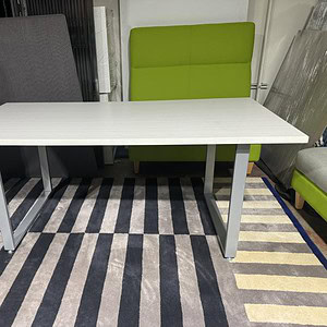 Modern 6x3 ft blonde wood Steelcase table for office or conference room.