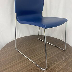 Blue Stack Chair with Steel Base for Office or Conference Rooms.