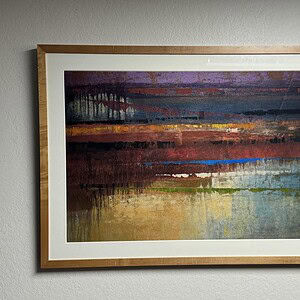 Abstract sunset cave painting, vibrant colors and textured brushstrokes.