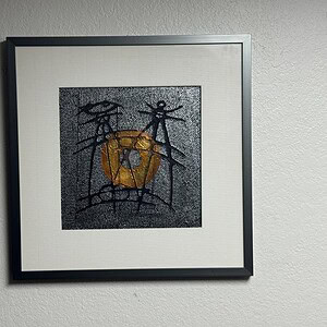Abstract third eye artwork in a 25x25 inch frame for commercial spaces.