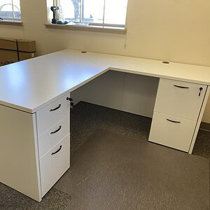 OFS white 6x6 double pedestal desk with multiple finishes, ideal for office productivity and modern.