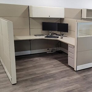 Modern 7x7 Ethospace cubicles with full privacy panels and workspace organization.