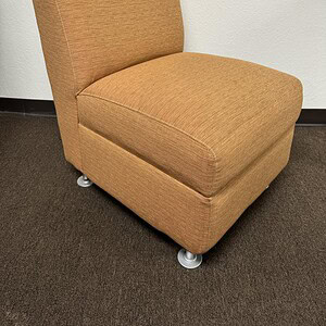 Modular seating in Sunset Orange, perfect for modern office or lounge areas. Customizable and stylis.