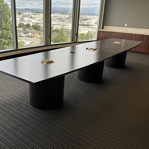 Shaped conference table, 16x4x42, ideal for corporate meetings and collaborative work.
