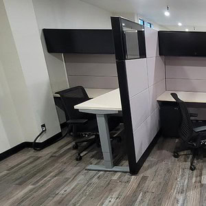 Adjustable Ethospace cubicles for customizable workspace solutions. Perfect for modern office enviro.