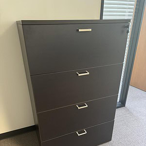 Durable 4-drawer lateral file cabinet for office storage solutions.