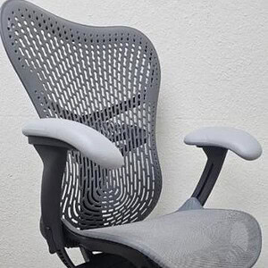 Herman Miller Mirra 2 ergonomic office chair in grey for optimal comfort.