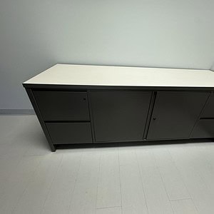 Herman Miller 6x2 storage and credenza unit in modern office setting.