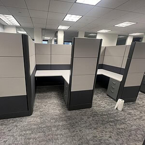 Office cubicles with black and silver Ethospace panels, 5x5x70 size, customizable workspace solution.