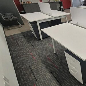 Benching stations for office work, 57"x27" White Poppin desks.