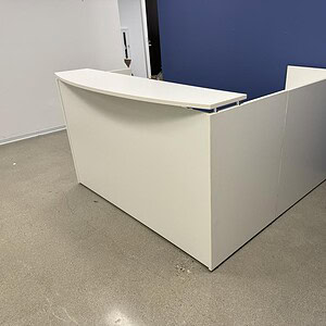 White 6x6 reception desk ideal for corporate and retail environments.