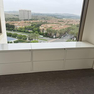 Drawer white lateral file cabinet for office storage and organization.