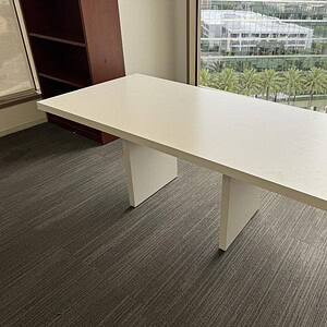 Modern 6x3 white conference table ideal for corporate meeting rooms.