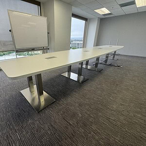 White 20 ft Boardroom Table for Corporate Meetings.