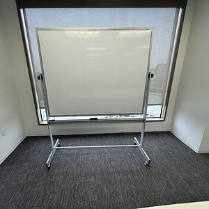 Mobile whiteboard on stand, 5x4 feet, ideal for presentations and meetings.