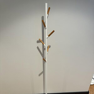 White coat rack with wooden hooks, ideal for modern home or office storage solutions.