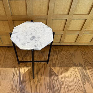 Octagon marble top steel side table for modern decor.