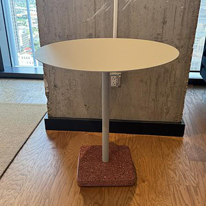 Top table with granite base, ideal for modern office or lounge settings.