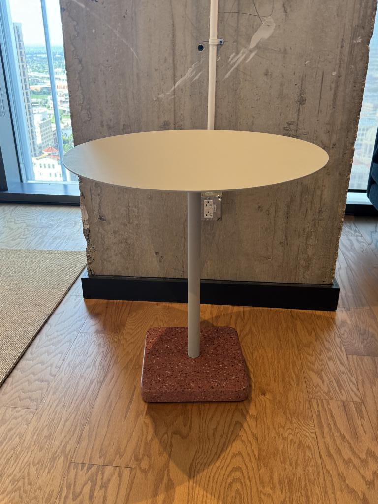 We Work 36in round metal top w/ granite base