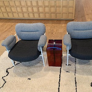Hay plush two tone grey lounge chairs for modern comfort and style. Perfect for living rooms or loun.