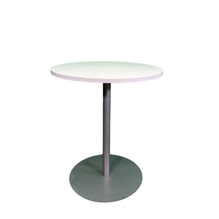 Round wooden table with steel base, ideal for modern interiors. Durable and stylish furniture piece.