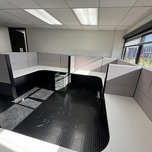 Modern Ethospace black & silver 6x8x54 bullpen workspace.