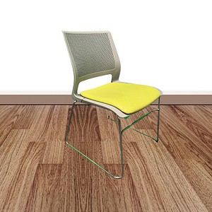 Sit On It Lumin sled chair with grey frame and green cushion for modern office or lounge spaces.