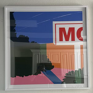 Colorful pop art mural at Sunset Motel with vibrant hues and bold design.