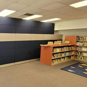 Ethospace library wall with Herman Miller panels in a modern office setting.