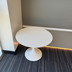 Elegant white Tulip medium occasional table ideal for living rooms and offices.