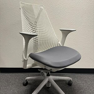 Herman Miller Sayl office chair with white frame and fixed arms.