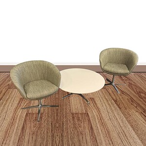 Elegant lounge chairs with a round table, perfect for modern office or reception areas.