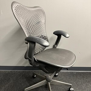 Herman Miller Fully Loaded Graphite office chair with ergonomic design and adjustable features.