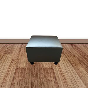 Herman Miller black square ottoman for modern office or home decor.
