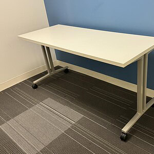 Herman Miller 5x2 nesting table with white top for office or conference room use.