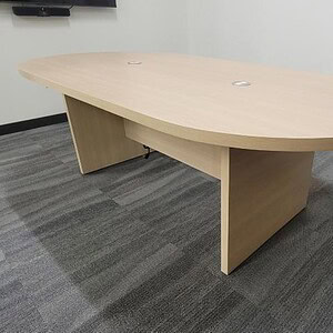 Beigewood racetrack table for gaming or office use, modern design, sturdy construction.