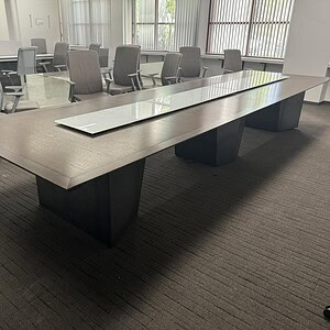 Veneer 16x5 Espresso conference table with electric outlets and glass top for modern office use.