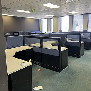 Ethospace 46-inch tall office cubicles with glass panels at Cube World USA.