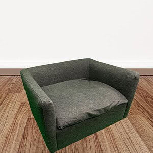 Oversized grey lounge chair with plush cushions, ideal for office or home relaxation spaces.