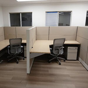 Office cubicles featuring Herman Miller Ethospace in stone and soft white colors for modern workspac.