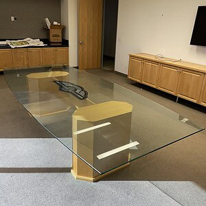 Boat shape glass conference table for modern office meeting rooms. Elegant 12x5/4 design with sturdy.