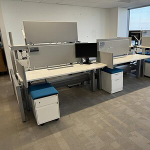 Adjustable Steelcase benching station with height adjustment, 72x30 inches, ideal for collaborative.