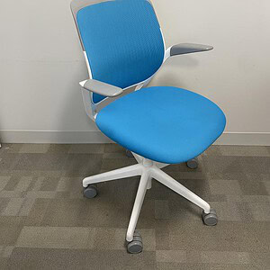 Modern Steelcase Cobi office chair in blue with adjustable armrests.