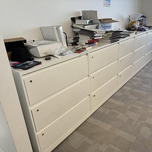 Lateral filing cabinets in white finish, ideal for office storage and organization.